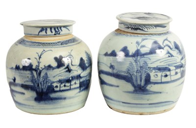 Lot 191 - TWO LATE MING CHINESE BLUE AND WHITE STONEWARE GINGER JARS AND COVERS