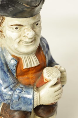 Lot 90 - A LATE 18TH/EARLY 19TH CENTURY PRATT TYPE TOBY JUG