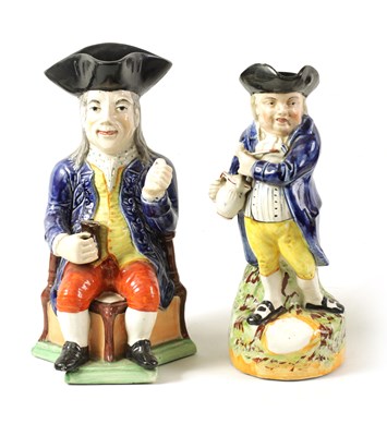 Lot 79 - A 19TH CENTURY STAFFORDSHIRE ‘ENGLISH SQUIRE’ TOBY JUG AND ANOTHER ‘HEARTY GOOD FELLOW’ TOBY JUG