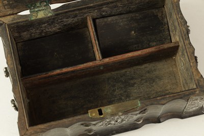 Lot 159 - AN 18TH CENTURY CEYLONESE CARVED EBONY AND SILVER METAL MOUNTED JEWELLERY BOX