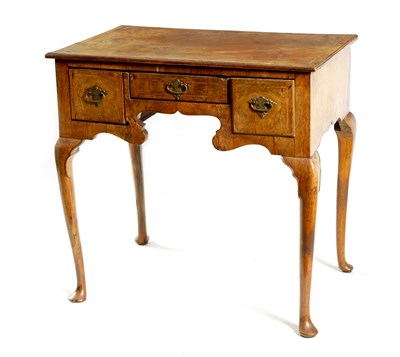 Lot 901 - A GEORGE I FIGURED WALNUT LOWBOY