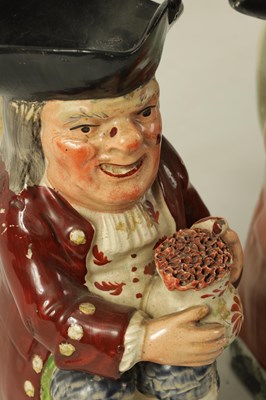 Lot 32 - TWO LATE 18TH/EARLY 19TH CENTURY RALPH WOOD TYPE STAFFORDSHIRE TOBY JUGS