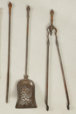 Lot 438 - TWO SETS OF BRASS AND STEEL FIRE IRONS