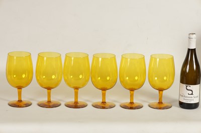 Lot 25 - A SET OF SIX URANIUM AMBER GLASS WINE GOBLETS