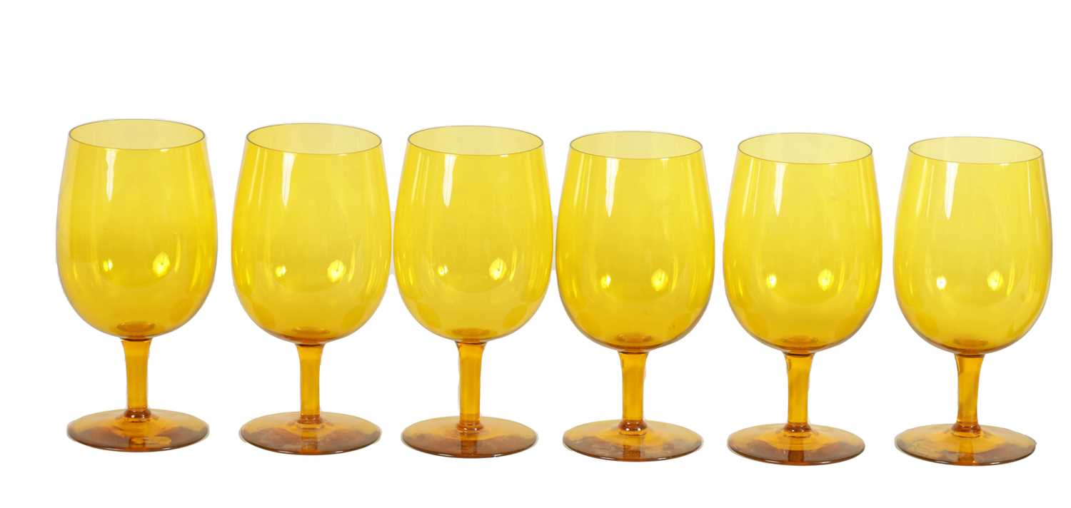Lot 25 - A SET OF SIX URANIUM AMBER GLASS WINE GOBLETS