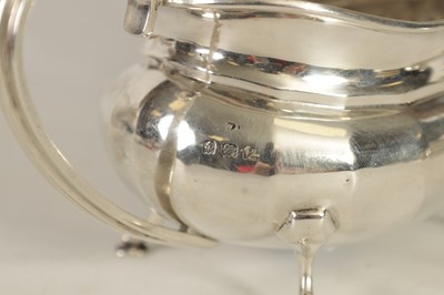 Lot 327 - A GEORGE V THREE-PIECE SILVER TEA SERVICE