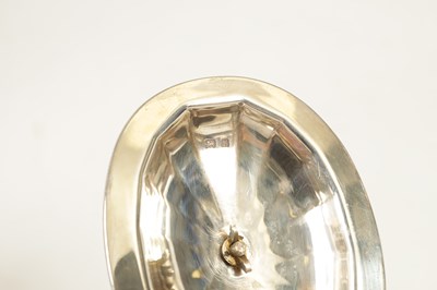 Lot 327 - A GEORGE V THREE-PIECE SILVER TEA SERVICE