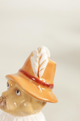 Lot 63 - A 20TH CENTURY ROYAL WORCESTER CANDLE EXTINGUISHER LIMITED EDITION “TOBY”