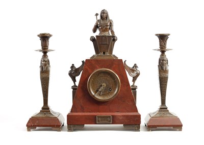 Lot 1080 - A LATE 19TH CENTURY EGYPTIAN STYLE FRENCH BRONZE AND ROUGE MARBLE CLOCK GARNITURE