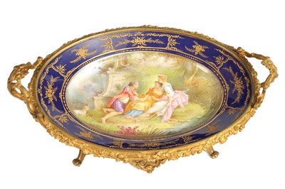 Lot 55 - A LATE 19TH CENTURY SERVES STYLE OVAL ORMOLU MOUNTED CENTREPIECE