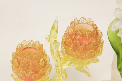 Lot 14 - A DECORATIVE 19TH CENTURY VASELINE GLASS TWO BRANCH CANDLE HOLDER