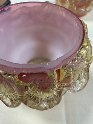Lot 14 - A DECORATIVE 19TH CENTURY VASELINE GLASS TWO BRANCH CANDLE HOLDER