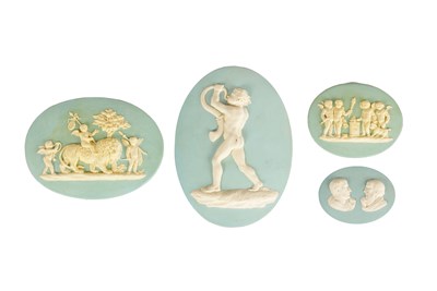 Lot 89 - A GROUP OF FOUR 19TH CENTURY WEDGWOOD BLUE AND WHITE JASPERWARE OVAL PLAQUES
