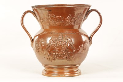 Lot 90 - AN OVERSIZED 19TH CENTURY BROWN SALT GLAZE STONEWARE TWO-HANDLED VASE STAMPED 'J & A SCHOFIELD 1835'