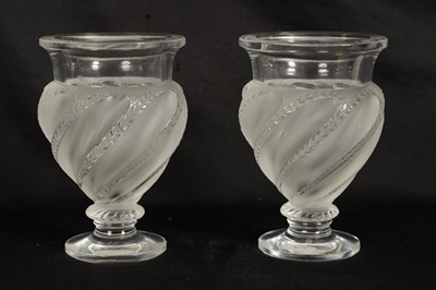 Lot 28 - A PAIR OF LALIQUE FROSTED AND CLEAR GLASS “ERMENONVILLE” VASES