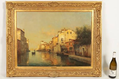 Lot 706 - ANTOINE BOUVARD SNR. (1870-1956). AN EARLY 20TH CENTURY OIL ON CANVAS VENETIAN CANAL SCENE