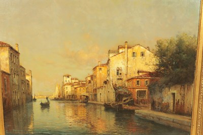 Lot 706 - ANTOINE BOUVARD SNR. (1870-1956). AN EARLY 20TH CENTURY OIL ON CANVAS VENETIAN CANAL SCENE