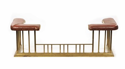Lot 512 - A LATE 19TH CENTURY BRASS CLUB HEARTH FENDER