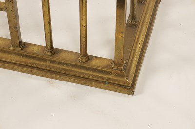 Lot 512 - A LATE 19TH CENTURY BRASS CLUB HEARTH FENDER