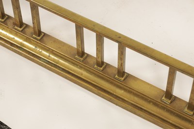 Lot 512 - A LATE 19TH CENTURY BRASS CLUB HEARTH FENDER