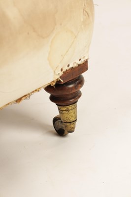 Lot 1186 - TWO LATE 19TH CENTURY HOWARD STYLE BUTTON UPHOLSTERED LOW SEATED ARMCHAIRS