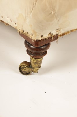 Lot 1186 - TWO LATE 19TH CENTURY HOWARD STYLE BUTTON UPHOLSTERED LOW SEATED ARMCHAIRS