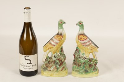 Lot 26 - A PAIR OF 19TH CENTURY STAFFORDSHIRE FIGURES