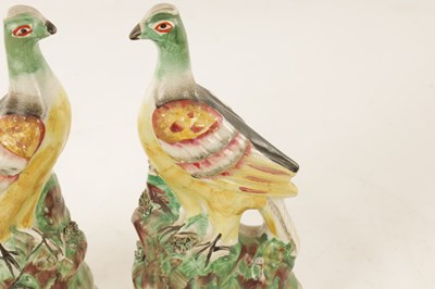 Lot 26 - A PAIR OF 19TH CENTURY STAFFORDSHIRE FIGURES