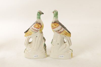 Lot 26 - A PAIR OF 19TH CENTURY STAFFORDSHIRE FIGURES