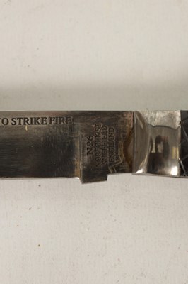 Lot 377 - AN OVERSIZED FOLDING KNIFE AND ANOTHER