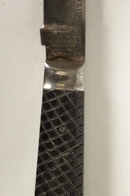 Lot 377 - AN OVERSIZED FOLDING KNIFE AND ANOTHER