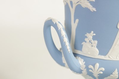 Lot 78 - A WEDGWOOD JASPERWARE CAMPANA SHAPED VASE AND COVER