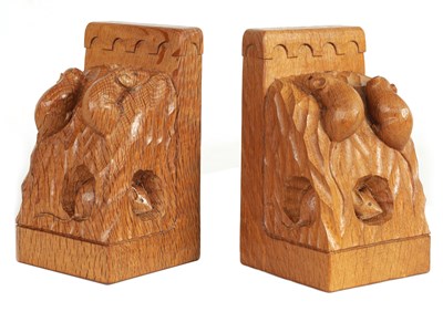 Lot 878 - AN UNUSUAL PAIR OF ROBERT ‘MOUSEMAN’ THOMPSON TRIPLE MICE ADZED OAK BOOK ENDS