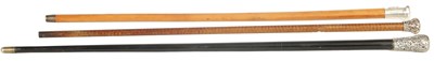 Lot 452 - A COLLECTION OF THREE SILVER TOPPED WALKING CANES