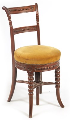 Lot 1244 - AN EARLY 19TH CENTURY MAHOGANY REVOLVING MUSIC CHAIR