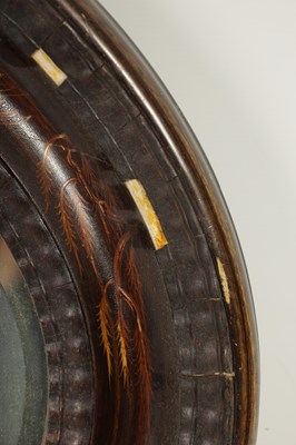 Lot 1714 - A 19TH CENTURY CHINOISERIE DECORATED OVAL LACQUERED HANGING MIRROR