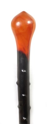 Lot 474 - A LATE 19TH CENTURY RHINOCEROS HORN WALKING CANE