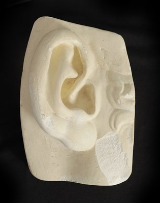 Lot 526 - AN OVER-SIZED PLASTERWORK SCULPTURE OF AN EAR