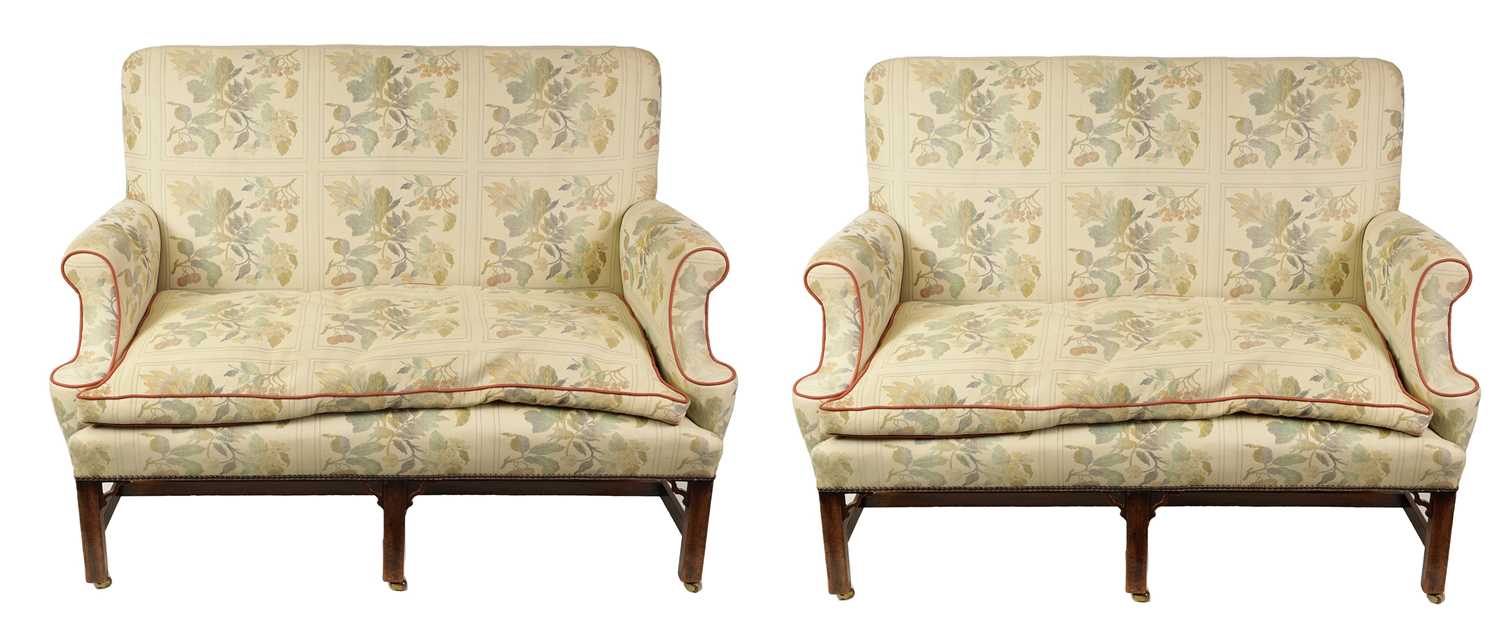 Lot 1447 - A PAIR OF GEORGE II STYLE TWO SEATER UPHOLSTERED MAHOGANY SETTEES