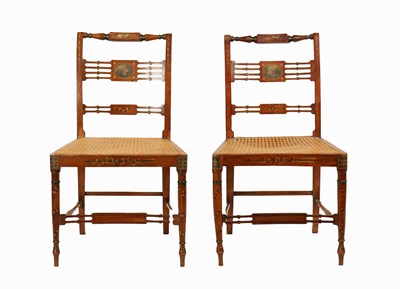 Lot 1336 - A PAIR OF REGENCY PAINTED SATINWOOD BERGERE SIDE CHAIRS