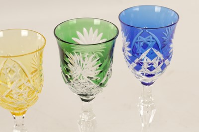 Lot 2 - A SET OF EIGHT 20TH CENTURY COLOURED CUT GLASS WINE GLASSES