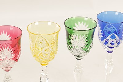 Lot 2 - A SET OF EIGHT 20TH CENTURY COLOURED CUT GLASS WINE GLASSES