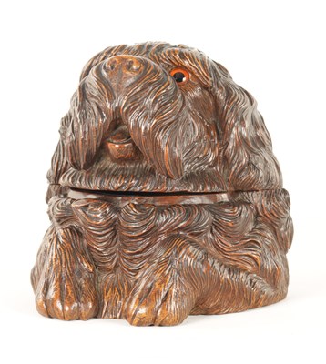 Lot 1140 - A 19TH CENTURY CARVED LINDEN WOOD BLACK FOREST TOBACCO JAR FORMED AS A DOG
