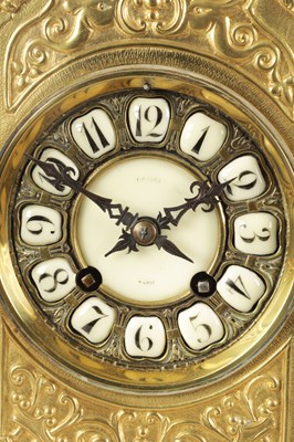 Lot 940 - A LATE 19TH CENTURY GILT BRASS AND SILVERED FRENCH INDUSTRIAL STYLE MANTEL CLOCK