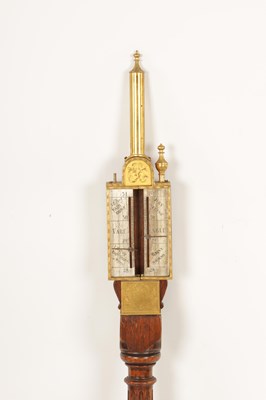Lot 900 - A 17TH CENTURY DESIGN WALNUT AND GILT BRASS PILLAR BAROMETER