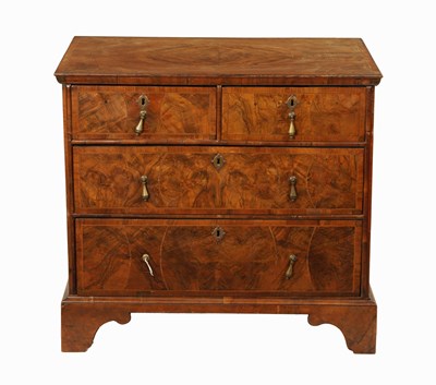 Lot 1259 - AN EARLY 18TH CENTURY GEOMETRICALLY INLAID FIGURED WALNUT CHEST