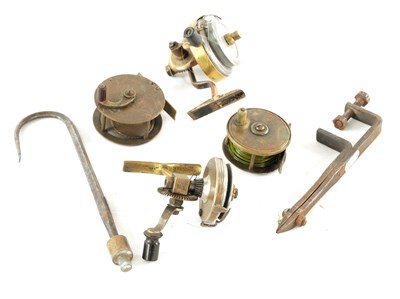 Lot 636 - A COLLECTION OF FOUR EARLY FISHING REELS