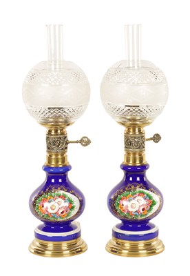 Lot 693 - A PAIR OF 20TH-CENTURY BLUE GLASS OIL LAMPS/ELECTRIC TABLE LAMPS