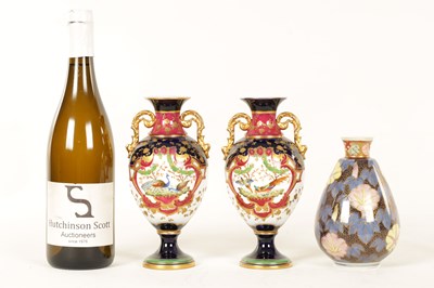 Lot 75 - A PAIR OF EARLY 20TH CENTURY 'H.M & CO' PORCELAIN VASES