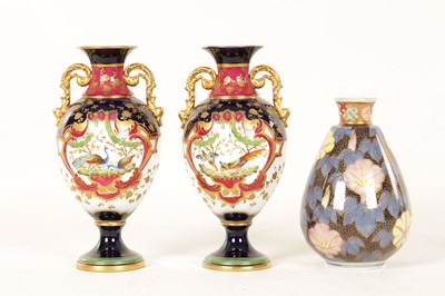 Lot 75 - A PAIR OF EARLY 20TH CENTURY 'H.M & CO' PORCELAIN VASES